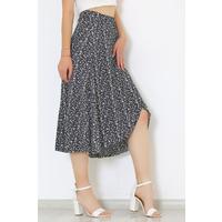 The skirt with a slit in the front is Black and white - 2250 555.