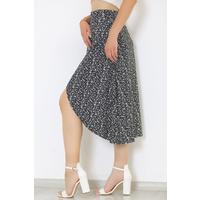 The skirt with a slit in the front is Black and white - 2250 555.